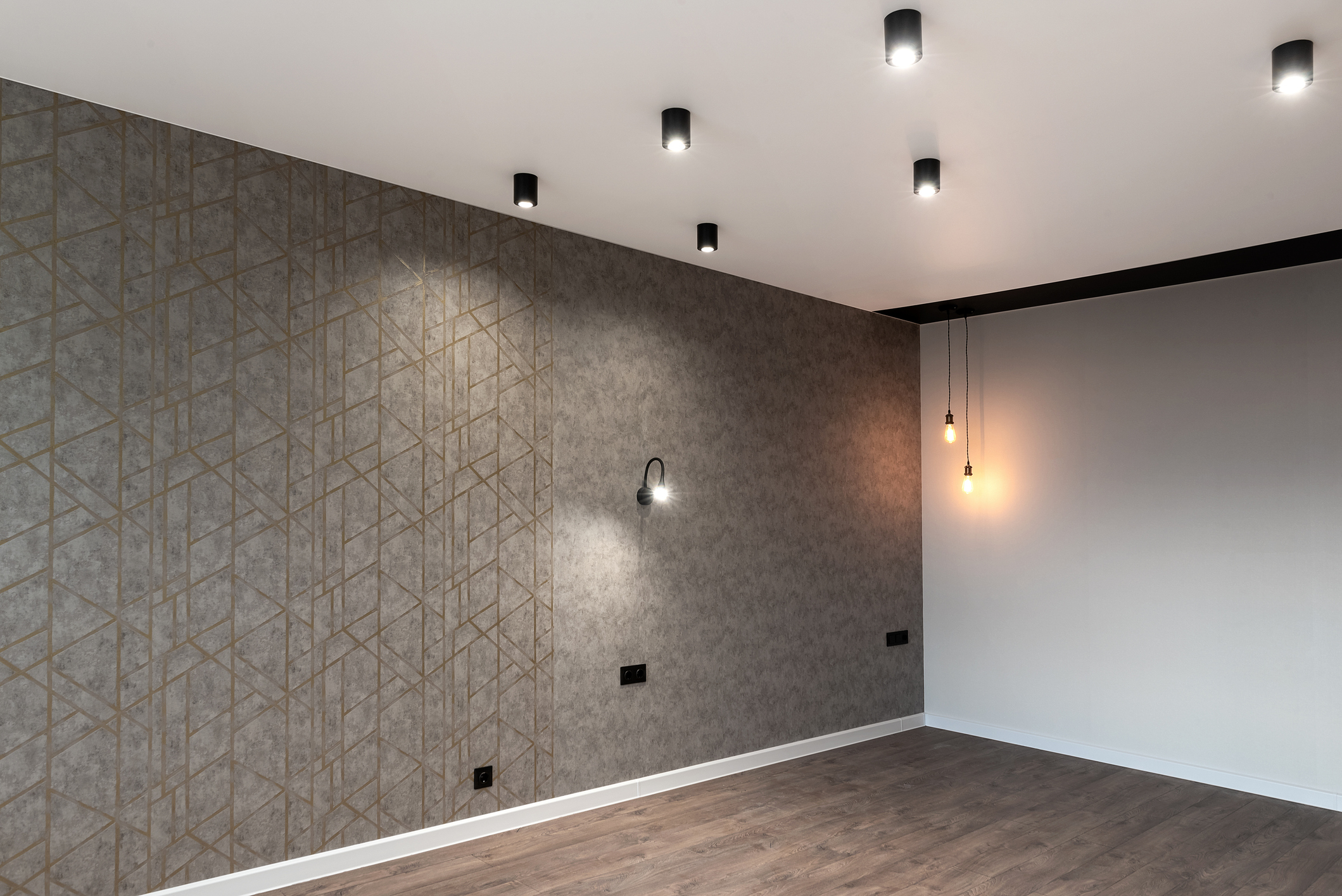 Modern new empty room with white and gray walls, led lamps and hardwood floor, copy space. New apartment in loft style Professionelle Tapezierarbeiten und Tapeten anbringen in Oberhausen und Umgebung - Schmidt Raumdesign